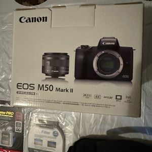 Brand new Canon EOS M50 Mark II with the EF-M 15-45mm is STM Kit and accessories